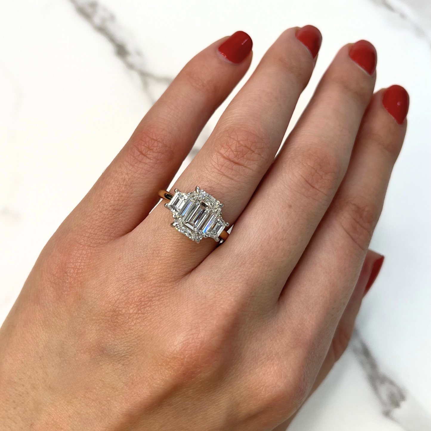 Emerald Cut Diamond Trapezoid Three Stone Ring