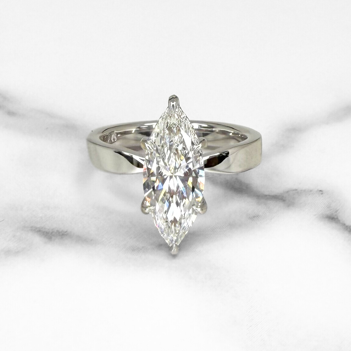 Marquise Diamond Wide Band Solitaire Ring